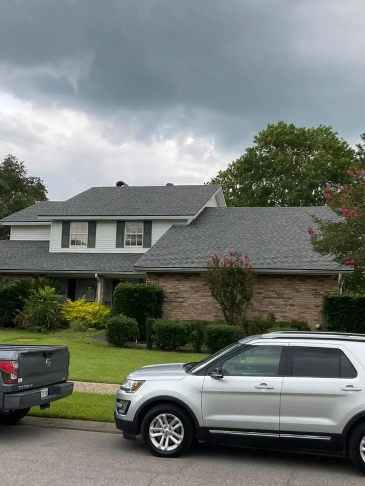 Slide of John Theriots Roofing