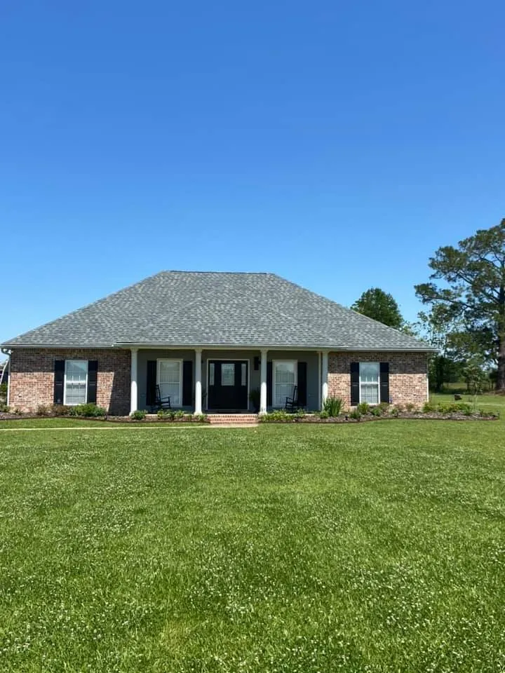 Slide of John Theriots Roofing
