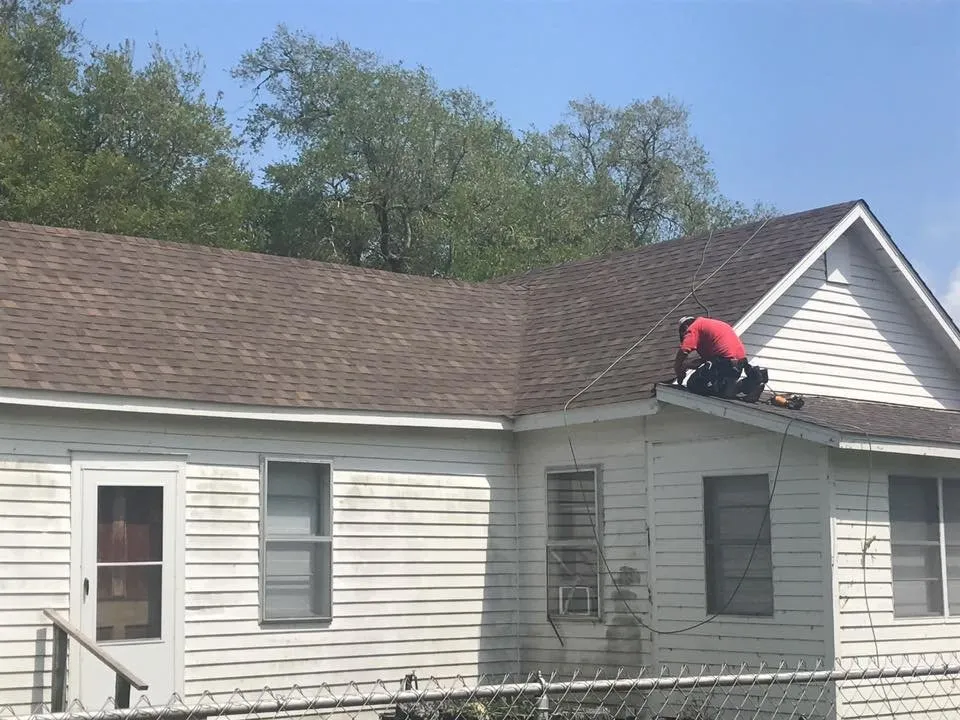 Slide of John Theriots Roofing