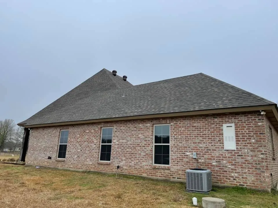 Slide of John Theriots Roofing