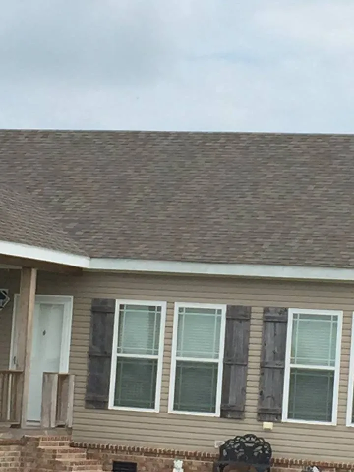 Slide of John Theriots Roofing