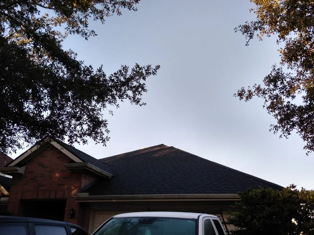 Slide of Johnny's Roofing and storm restoration