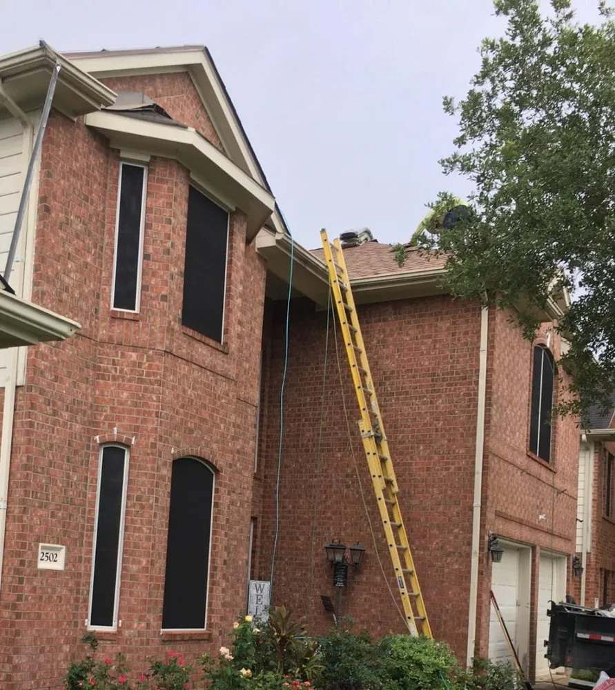 Slide of Johnny's Roofing and storm restoration