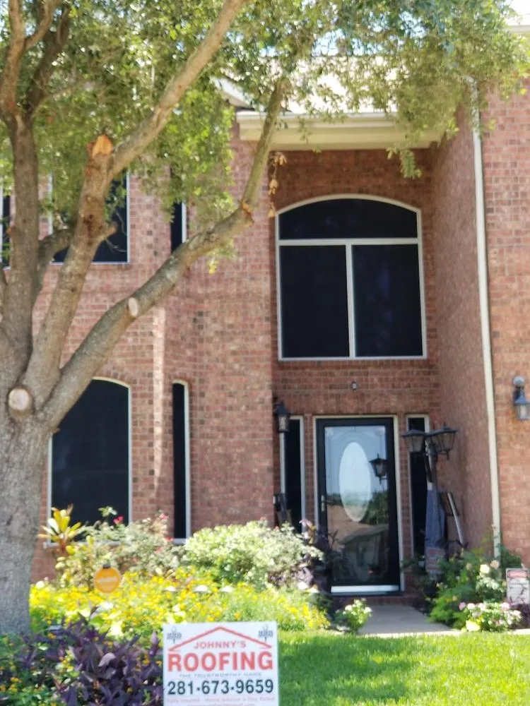 Slide of Johnny's Roofing and storm restoration