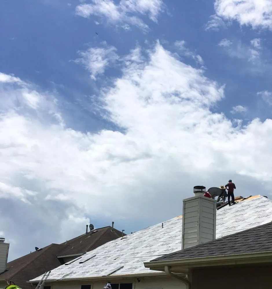 Slide of Johnny's Roofing and storm restoration