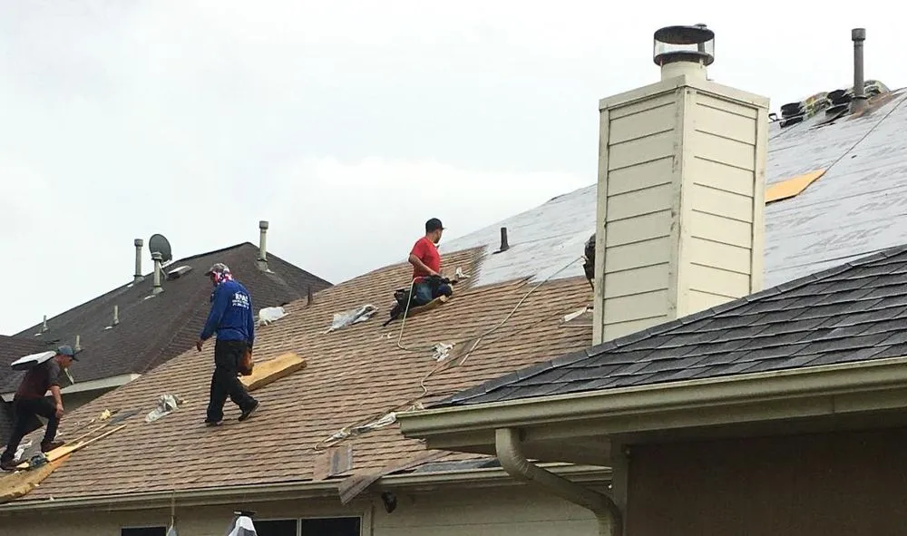 Slide of Johnny's Roofing and storm restoration