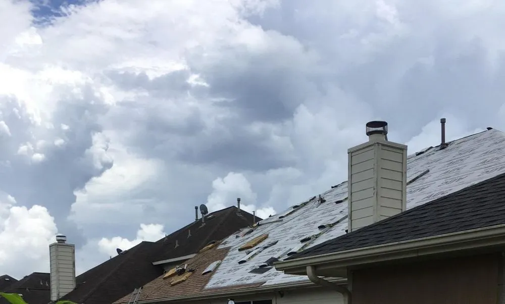 Slide of Johnny's Roofing and storm restoration