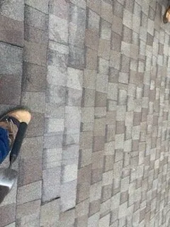 Slide of Johnny's Roofing and storm restoration