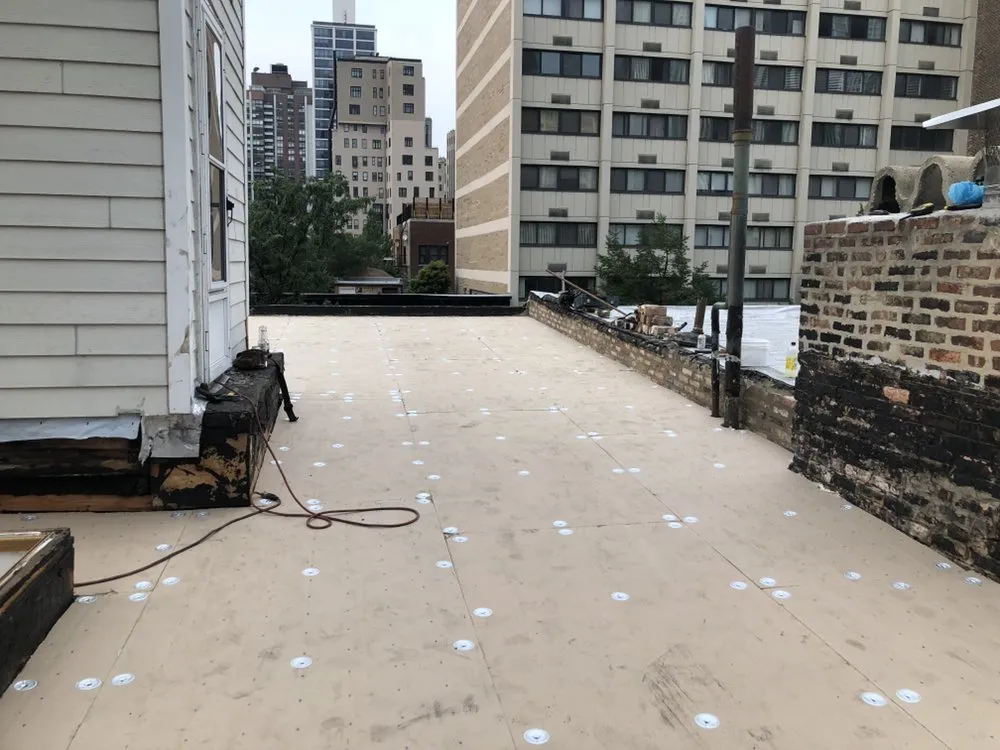 Slide of John's Masonry Roofing & Construction