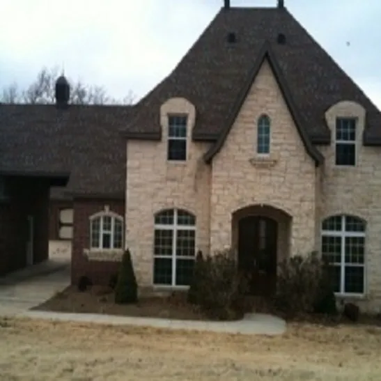 Slide of Johns Quality Roofing