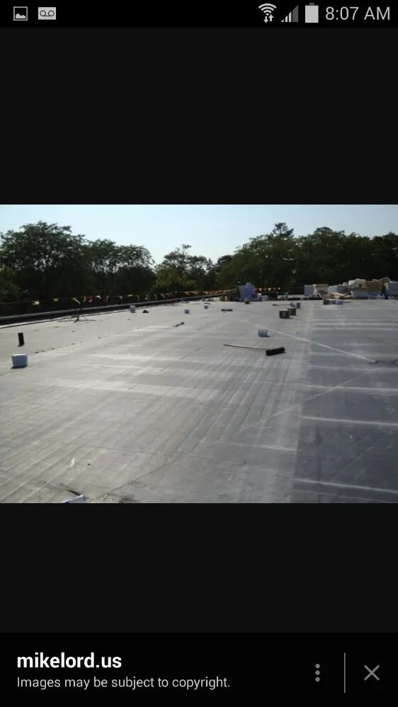 Slide of John's Roofing & Masonry