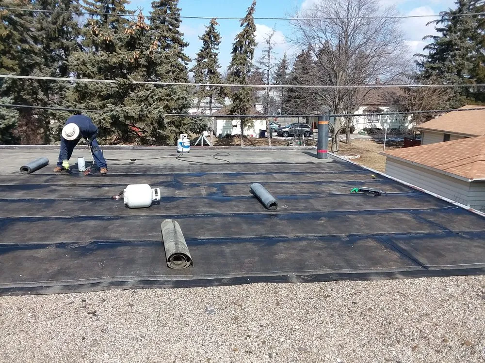 Slide of John's Roofing And Masonry