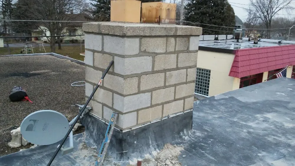 Slide of John's Roofing And Masonry