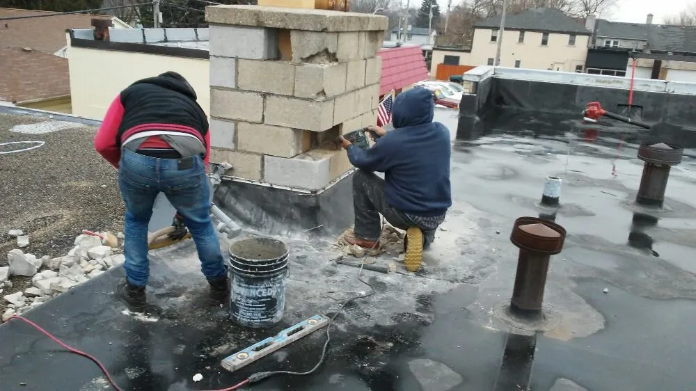 Slide of John's Roofing And Masonry