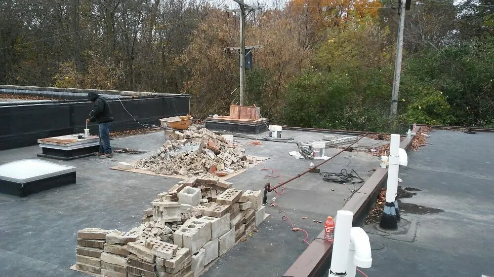 Slide of John's Roofing And Masonry