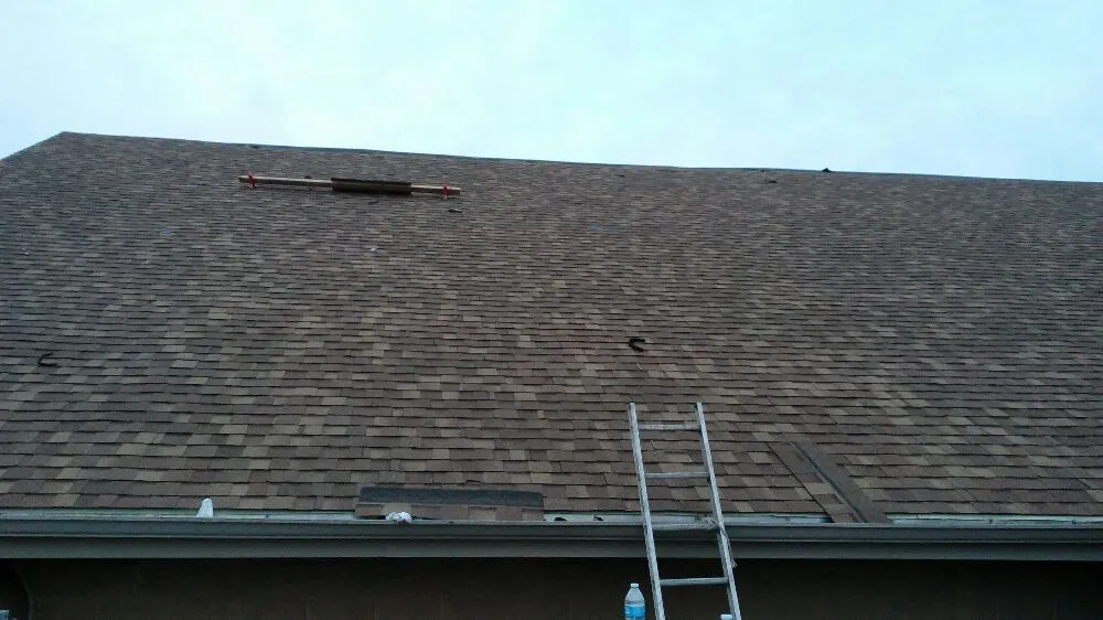 Slide of John's Roofing And Masonry