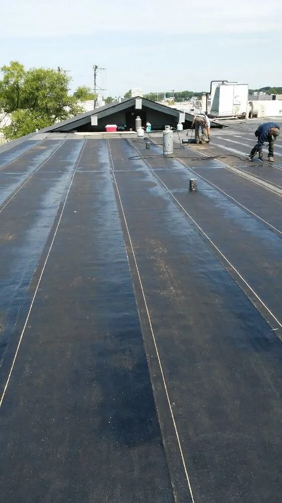 Slide of John's Roofing And Masonry