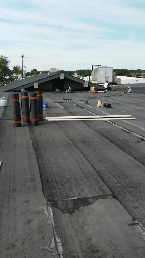 Slide of John's Roofing And Masonry