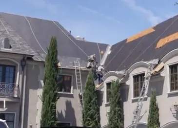 Slide of John's Roofing