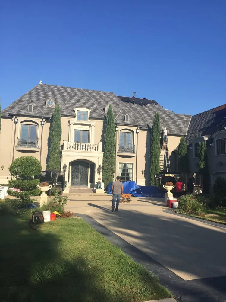 Slide of John's Roofing