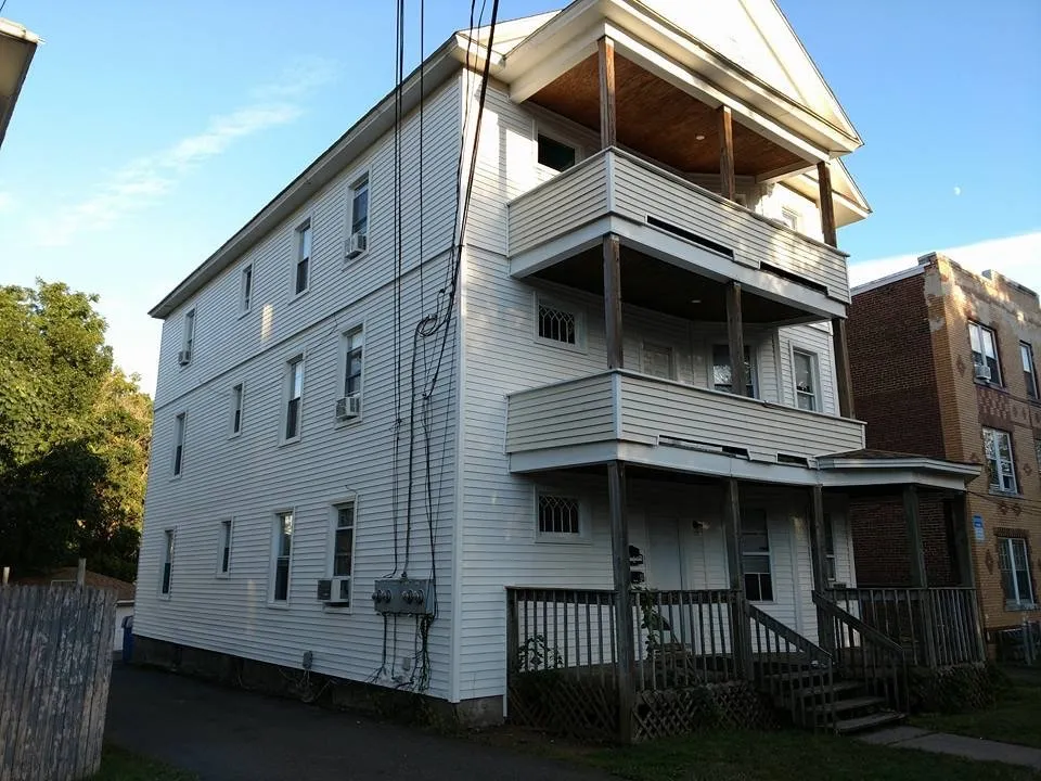 Slide of John's Roofing Siding & Windows