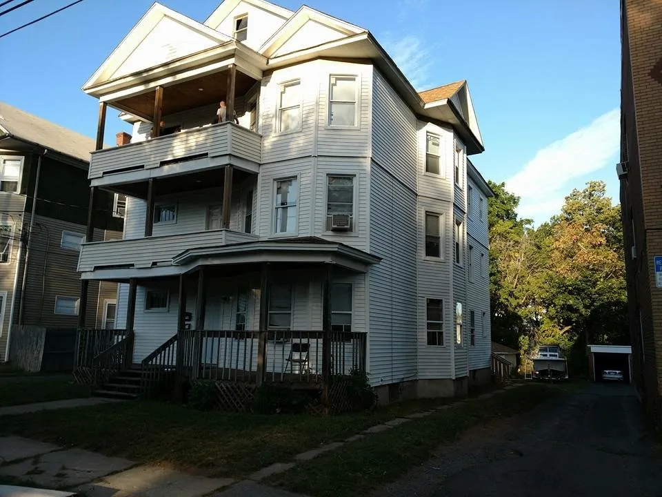 Slide of John's Roofing Siding & Windows