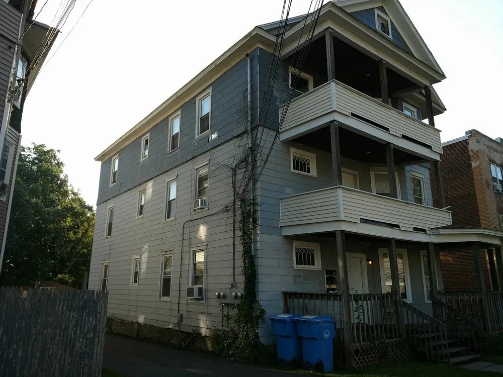 Slide of John's Roofing Siding & Windows