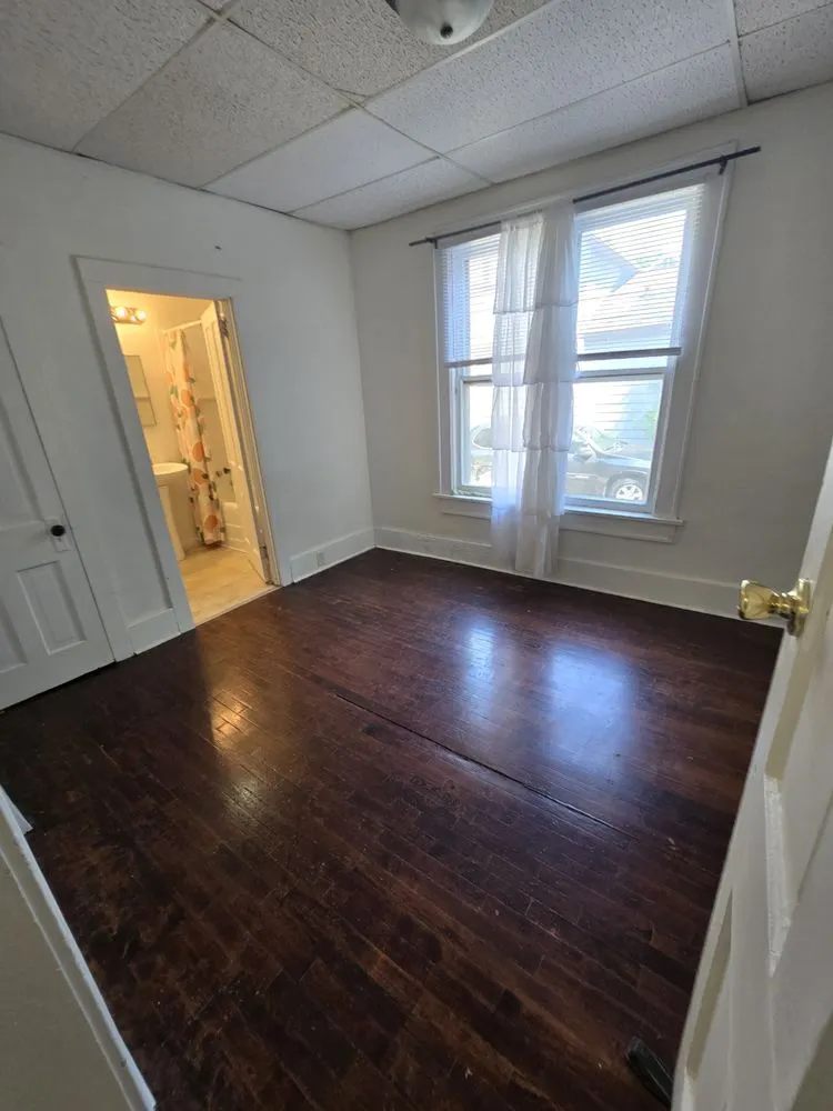 Slide of John's Tree Roofing and Construction