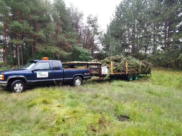 Slide of John's Tree Roofing and Construction