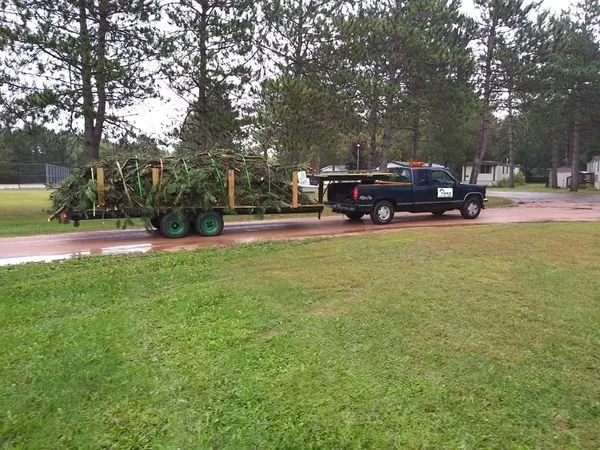 Slide of John's Tree Roofing and Construction