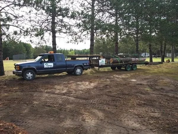 Slide of John's Tree Roofing and Construction