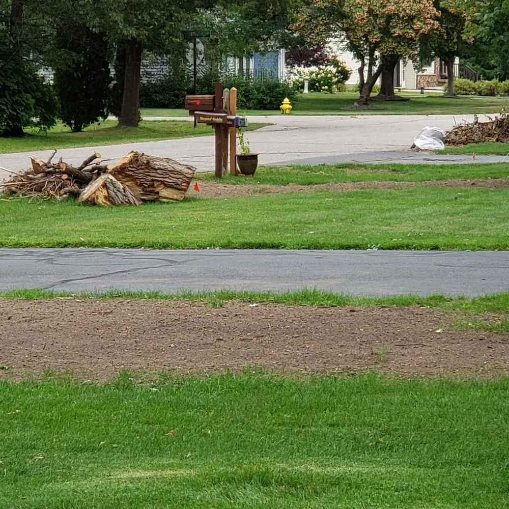 Slide of John's Tree Roofing and Construction