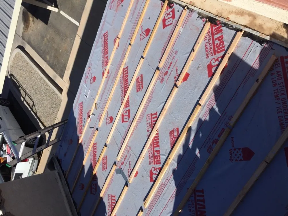 Slide of Johnson Roofing