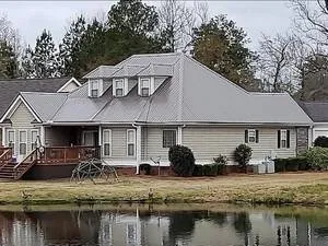 Slide of Johnson Roofing Service