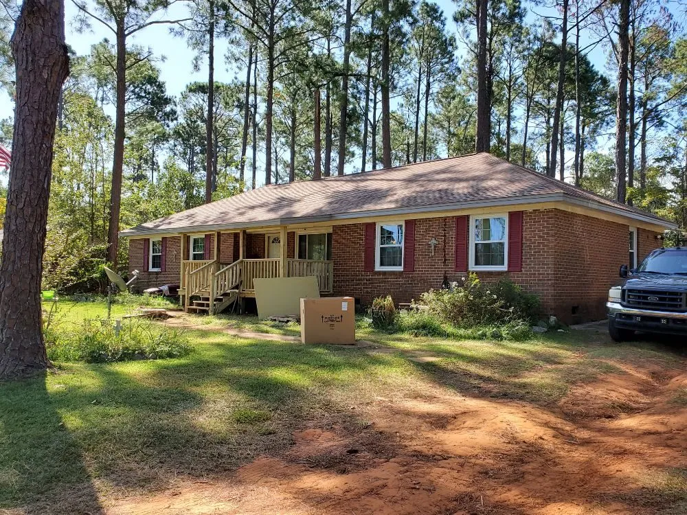 Slide of Johnson Roofing Service
