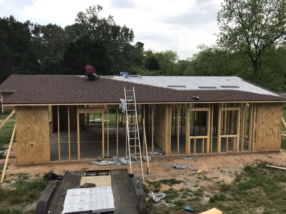 Slide of Johnson Roofing Service