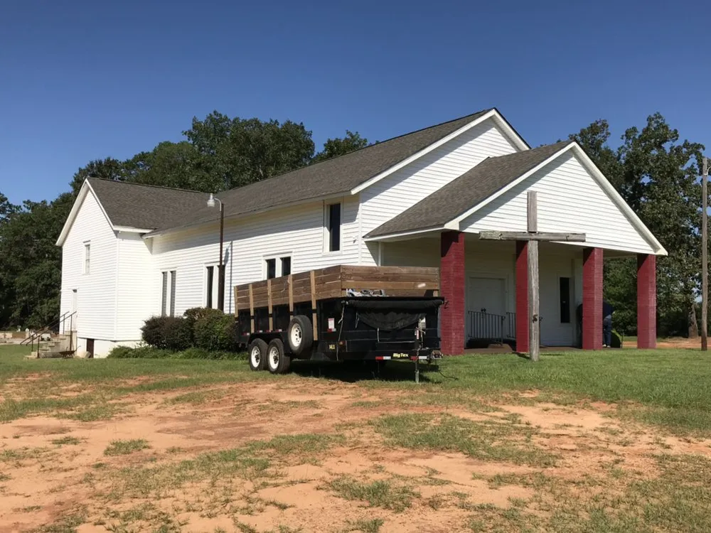 Slide of Johnson Roofing Service