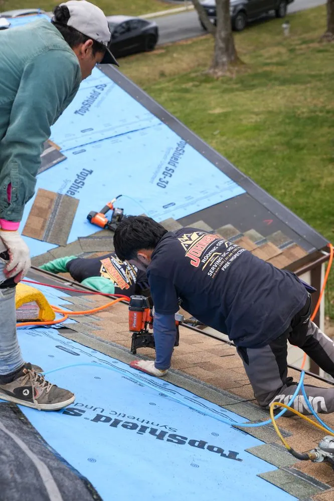 Slide of Johnson Roofing Service