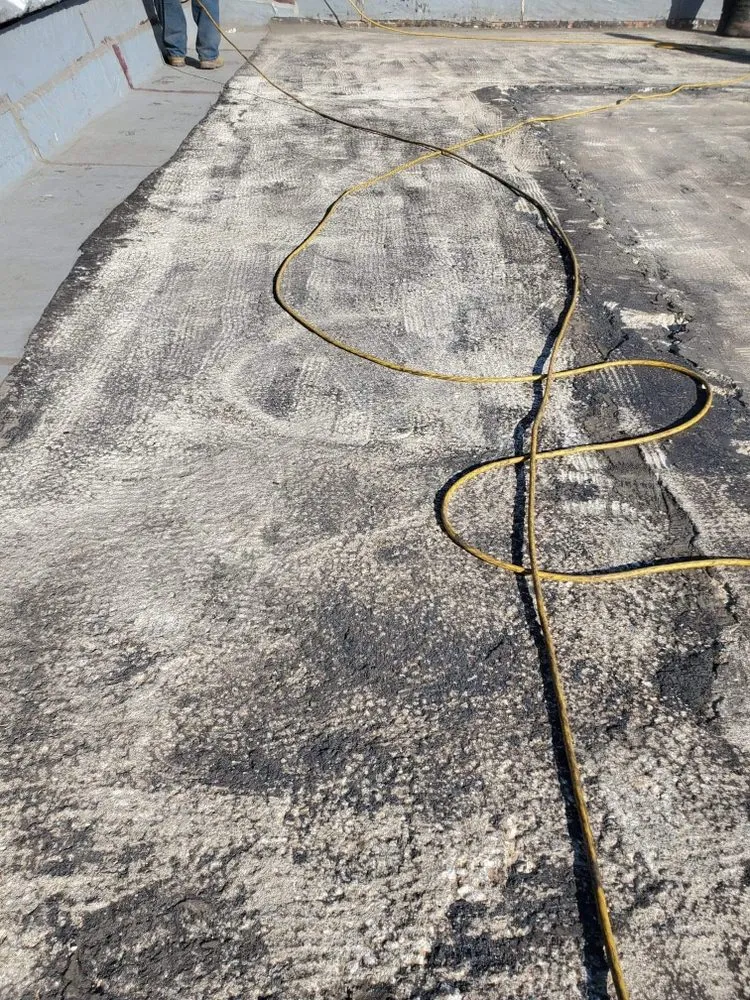 Slide of Jojos Roofing