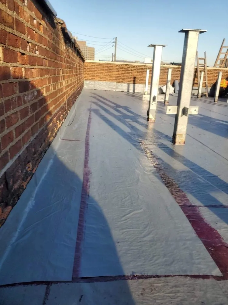 Slide of Jojos Roofing