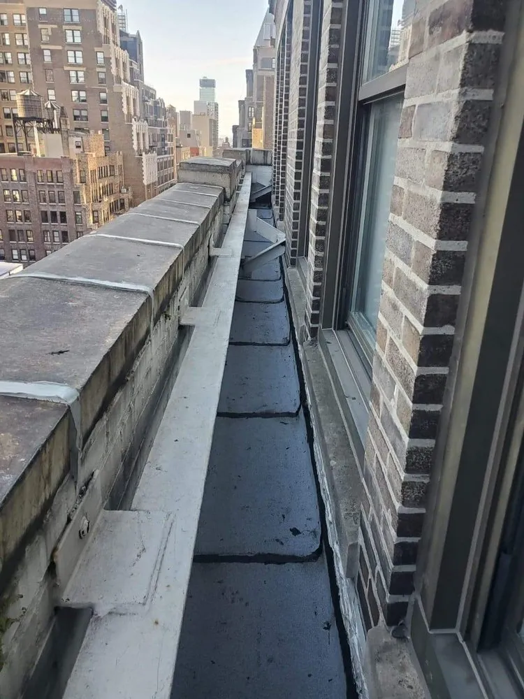 Slide of Jojos Roofing