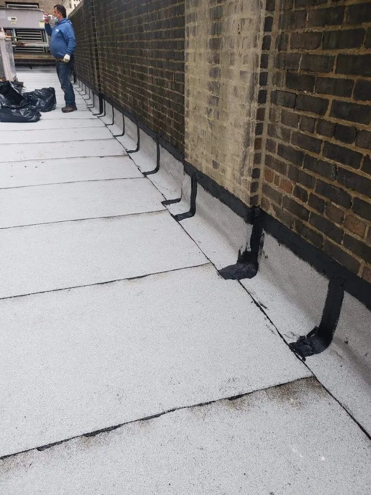 Slide of Jojos Roofing