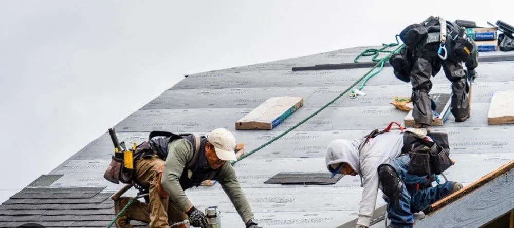 Slide of Jolly Giant Roofing