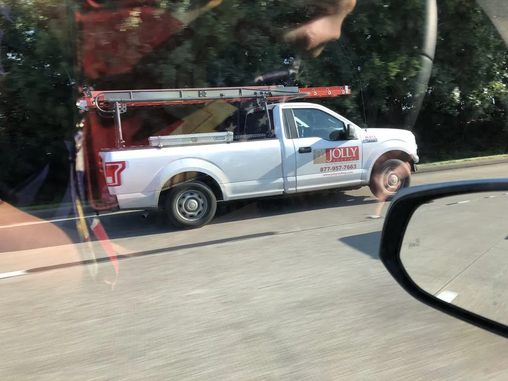 Slide of Jolly Roofing