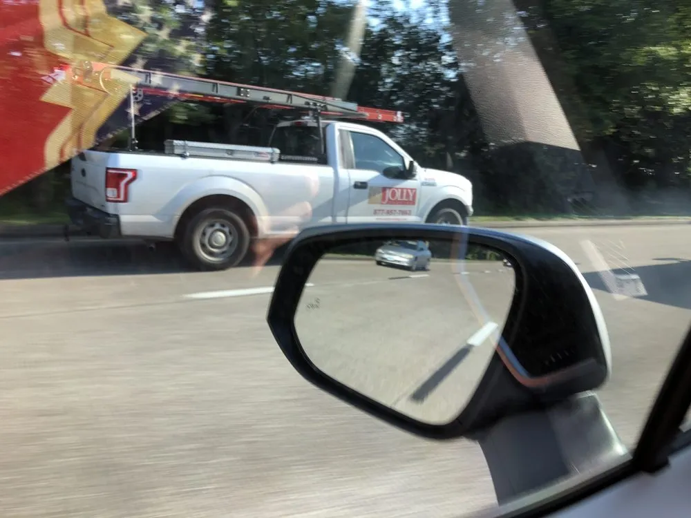 Slide of Jolly Roofing