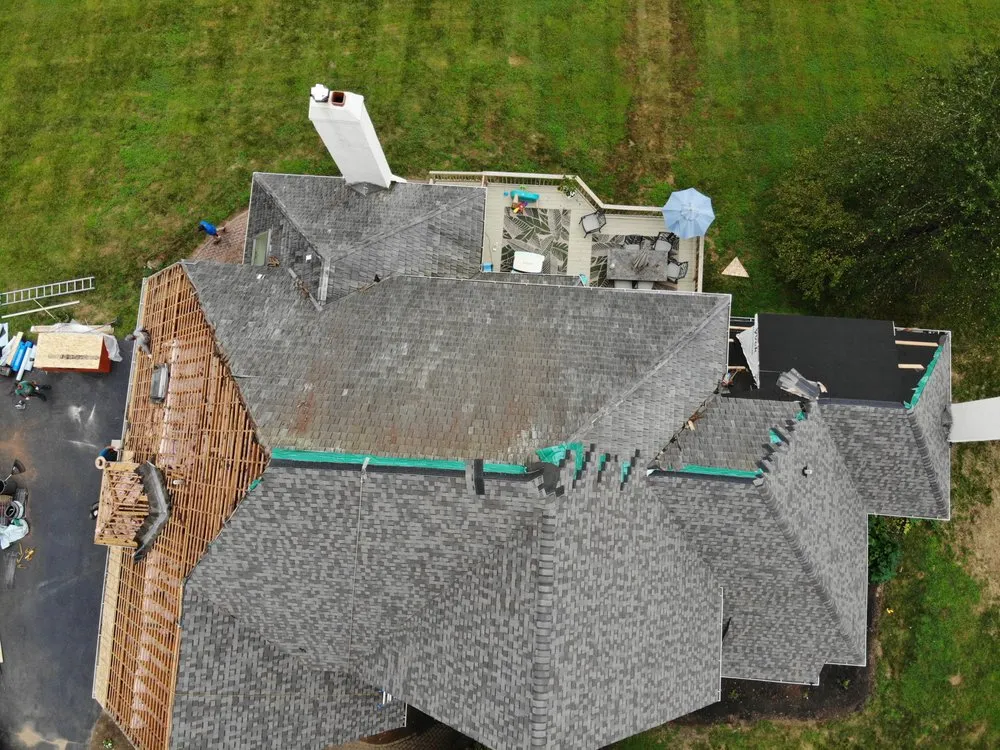 Slide of Jonny and Brothers Roofing