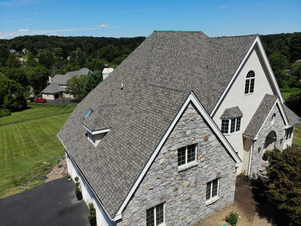 Slide of Jonny and Brothers Roofing