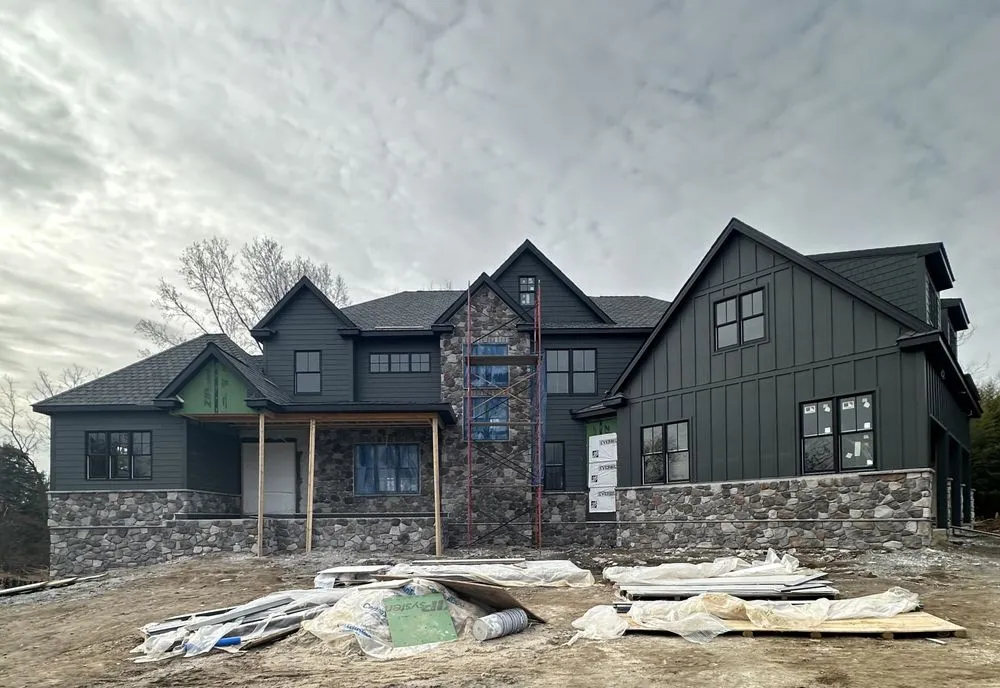 Slide of Jonny and Brothers Roofing