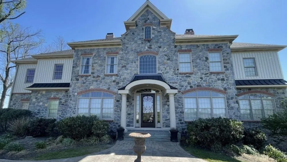 Slide of Jonny and Brothers Roofing