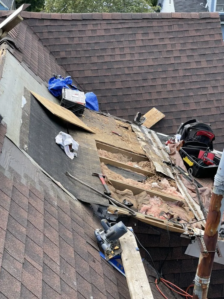 Slide of Jonnys Roofing & Siding Services